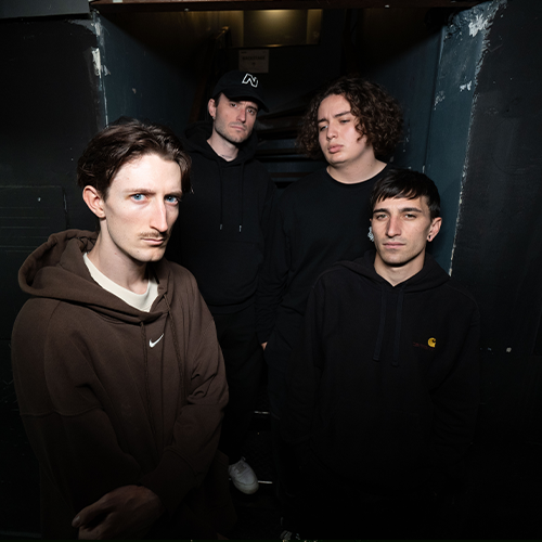 Photo des 4 membres du groupe AURORE, fixant l'objectif.